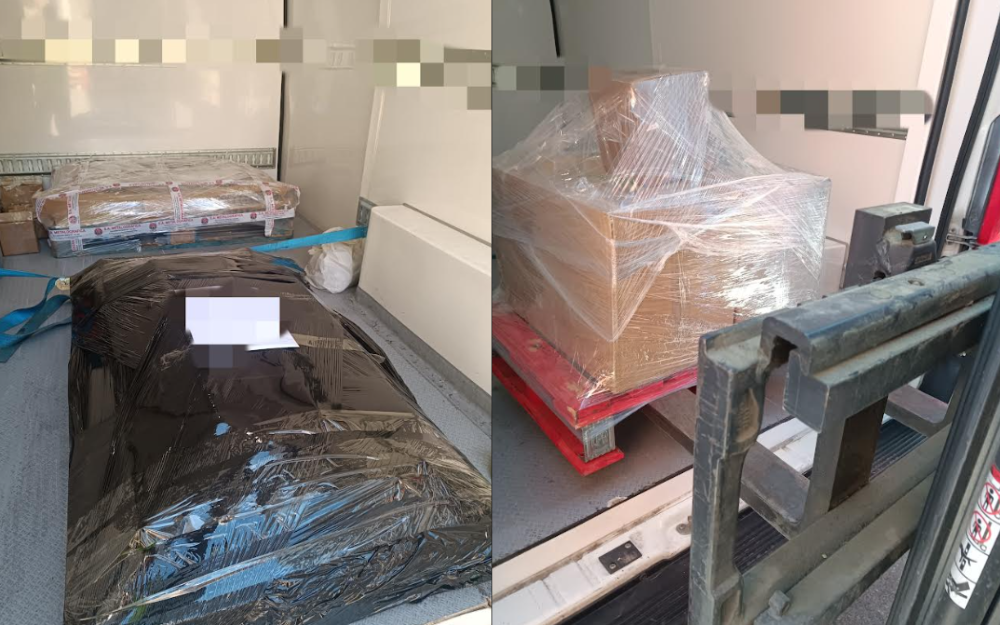 Carga empresarial preparada para transporte urgente dedicado en Barcelona con vehículo exclusivo de Vengoo.